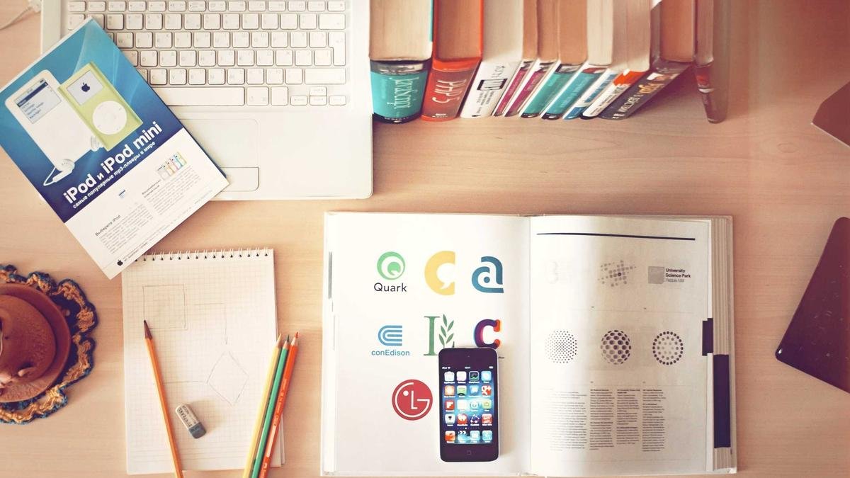 Brand design materials laid out on a desk